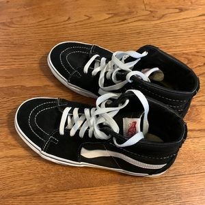 Black and white hightop vans